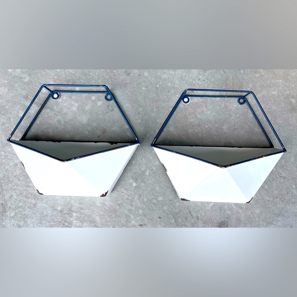 Two metal hexagon shaped pocketed wall decor